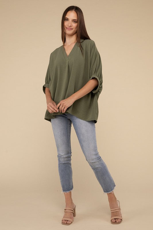 WOVEN AIRFLOW V-NECK PUFF HALF SLEEVE TOP