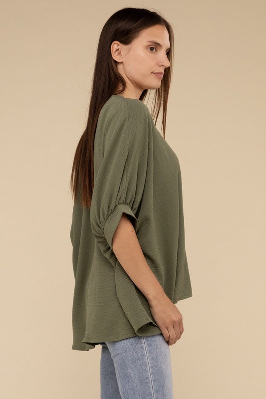 WOVEN AIRFLOW V-NECK PUFF HALF SLEEVE TOP